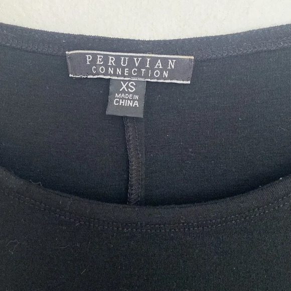 PERUVIAN Connection black long sleeve dress with sheer detail at bottom size XS - Picture 2 of 3